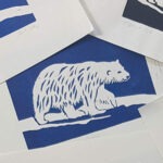 Kleines Rundes Vorschaubild mit einm Linolschnitt von einem Eisbären, Hintergrund in blau.
